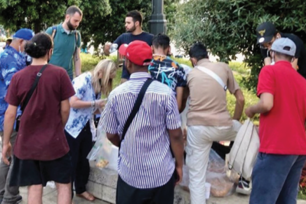 7B Foto Milaan - missionair werker immigranten en vluchtelingen.png